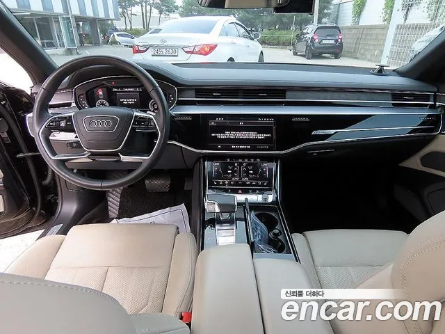 Audi A8 55 TFSI quattro Premium LWB — Фото автомобиля 7