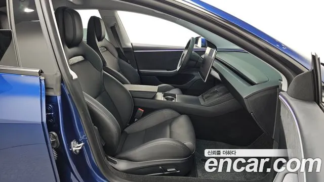 Tesla Model 3 — Фото автомобиля 11