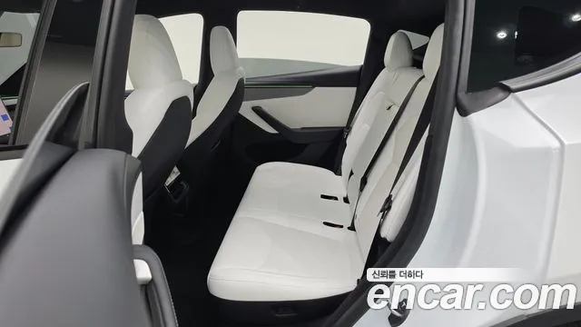 Tesla Model Y — Фото автомобиля 7
