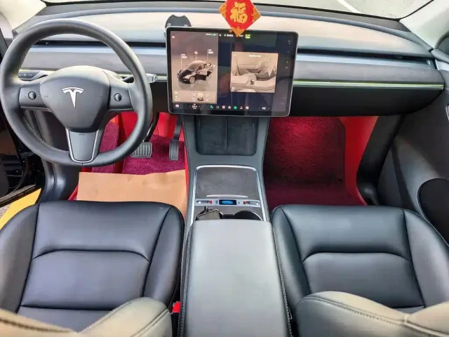 Tesla Model Y — Фото автомобиля 5