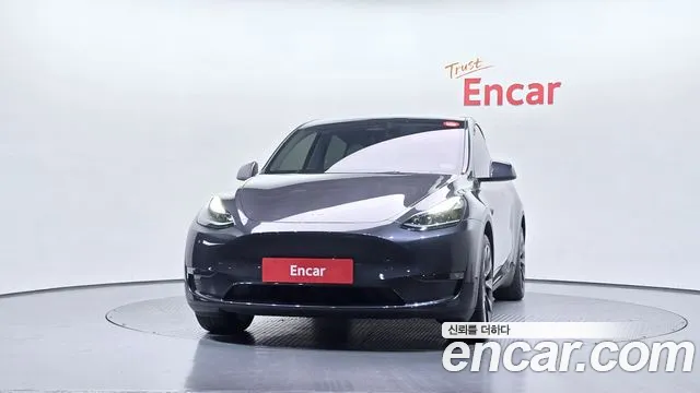 Tesla Model Y — Фото автомобиля 3