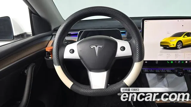 Tesla Model Y — Фото автомобиля 13