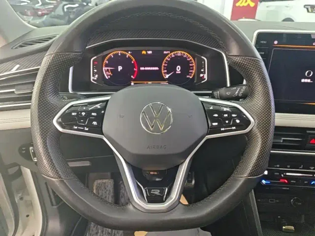 Volkswagen Tiguan L — Фото автомобиля 10