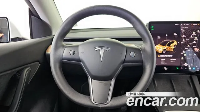 Tesla Model Y — Фото автомобиля 12
