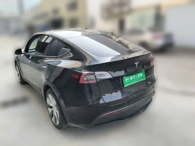 Tesla Model Y — Фото автомобиля 6