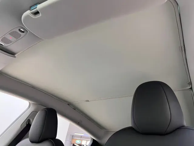 Tesla Model Y — Фото автомобиля 14