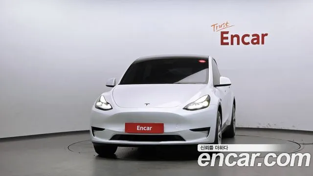 Tesla Model Y — Фото автомобиля 3
