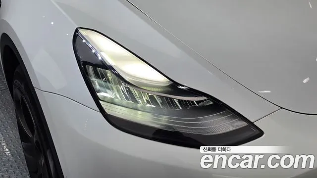 Tesla Model Y — Фото автомобиля 7