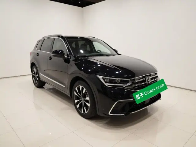 Volkswagen Tiguan L — Фото автомобиля 3