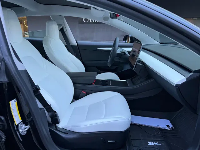 Tesla Model 3 — Фото автомобиля 12