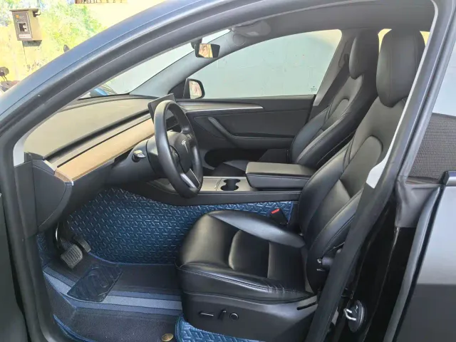 Tesla Model Y — Фото автомобиля 4