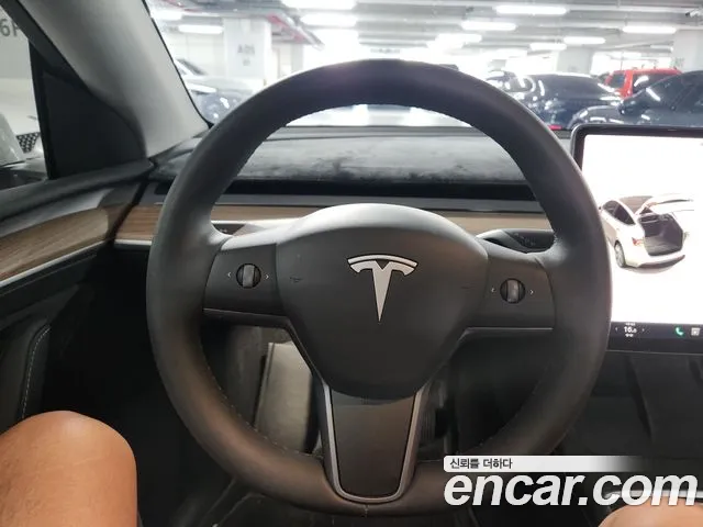 Tesla Model Y — Фото автомобиля 9