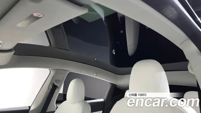 Tesla Model Y — Фото автомобиля 23