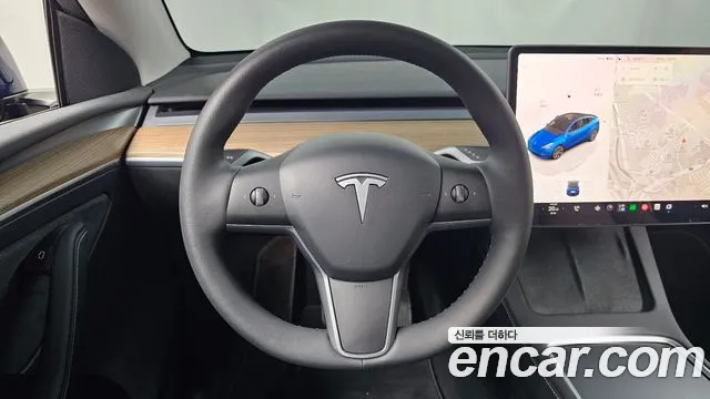 Tesla Model Y — Фото автомобиля 19