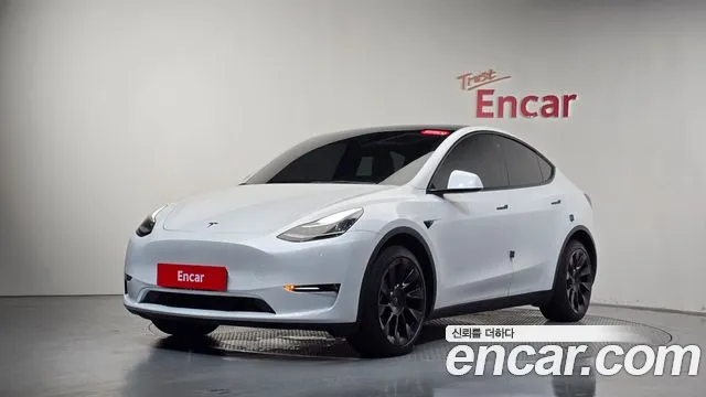 Tesla Model Y — Фото автомобиля 10