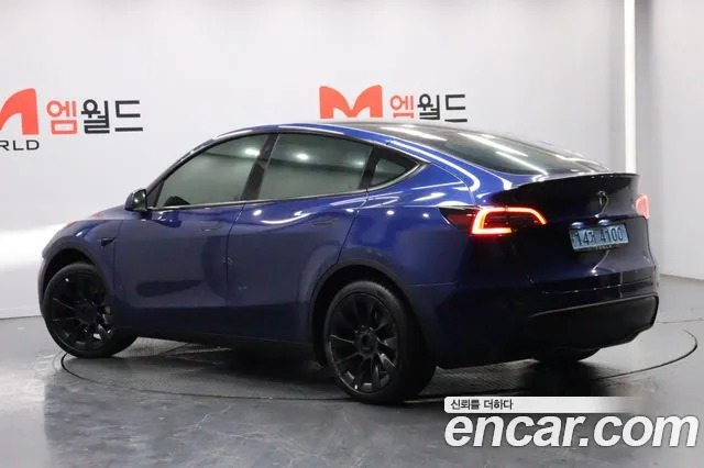 Tesla Model Y — Фото автомобиля 5