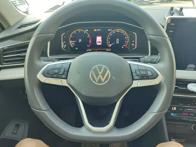 Volkswagen Tiguan L — Фото автомобиля 6