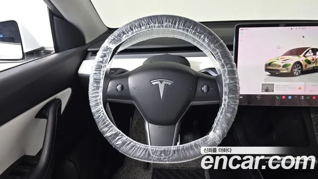 Tesla Model Y — Фото автомобиля 19