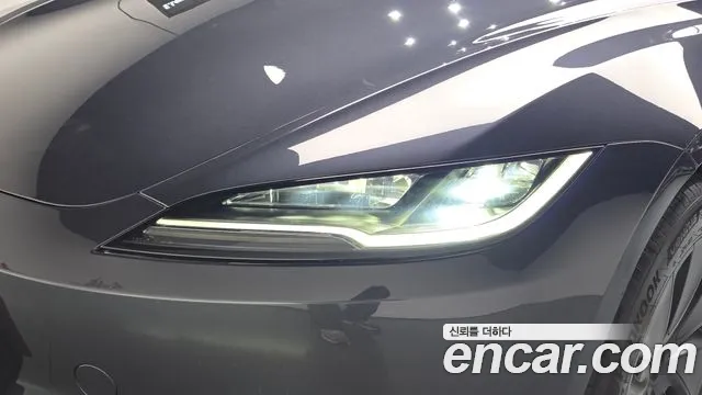 Tesla Model 3 — Фото автомобиля 7