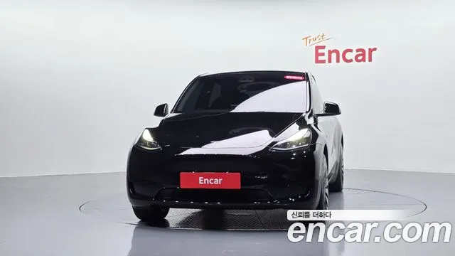 Tesla Model Y — Фото автомобиля 2