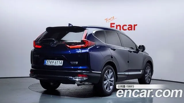 Honda CR-V CR-V 5-е поколение 2.0 гибрид Touring 4WD — Фото автомобиля 2