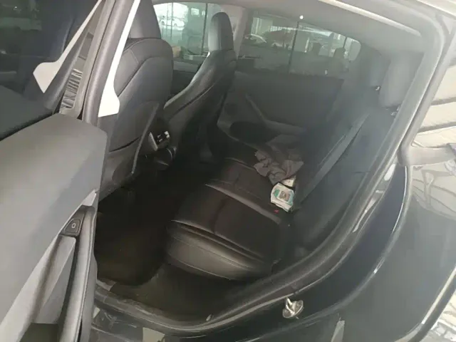Tesla Model Y — Фото автомобиля 16