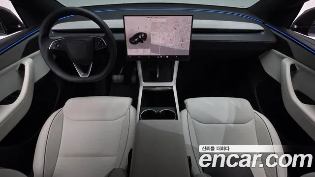 Tesla Model Y — Фото автомобиля 10