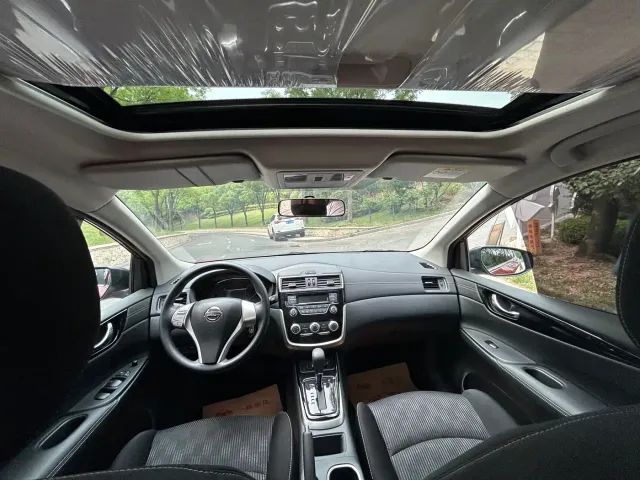 Nissan Tiida — Фото автомобиля 12