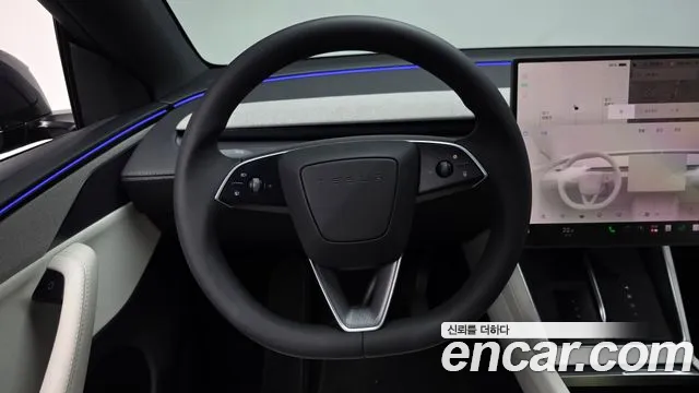 Tesla Model Y — Фото автомобиля 19