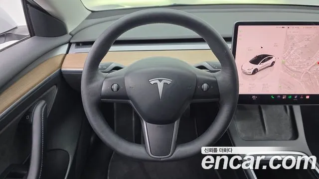 Tesla Model 3 — Фото автомобиля 13
