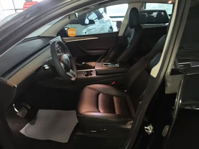 Tesla Model Y — Фото автомобиля 14