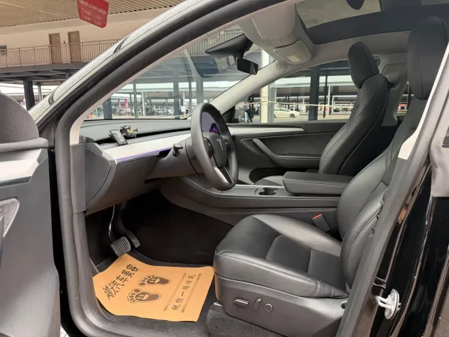 Tesla Model Y — Фото автомобиля 7