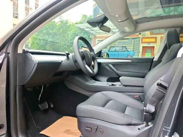 Tesla Model Y — Фото автомобиля 7