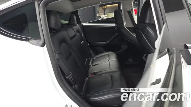 Tesla Model Y — Фото автомобиля 18