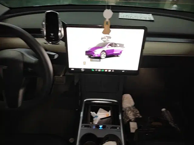 Tesla Model Y — Фото автомобиля 12