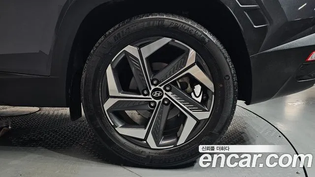 Hyundai Tucson Tucson (NX4) Бензин 1.6 турбо 2WD — Фото автомобиля 19