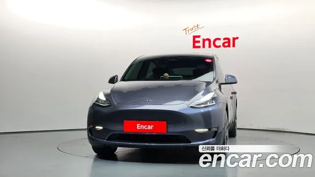 Tesla Model Y — Фото автомобиля 3
