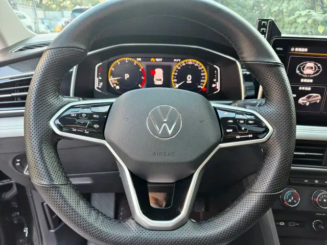 Volkswagen Tiguan L — Фото автомобиля 11