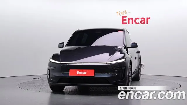 Tesla Model Y — Фото автомобиля 3