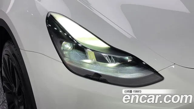 Tesla Model Y — Фото автомобиля 7