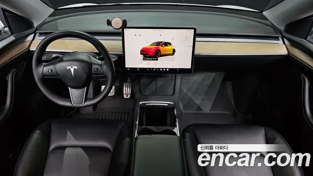 Tesla Model Y — Фото автомобиля 7