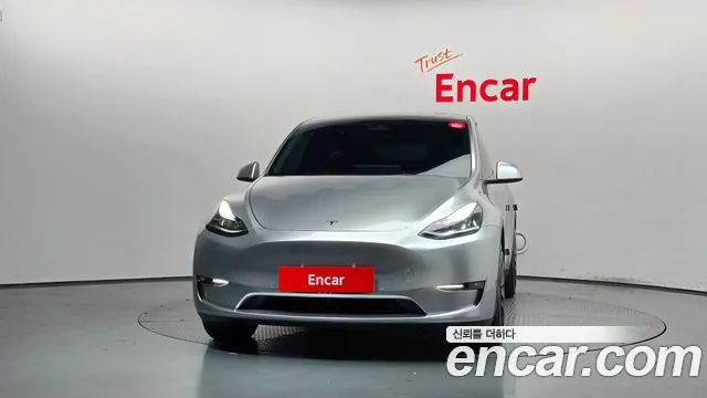 Tesla Model Y — Фото автомобиля 3