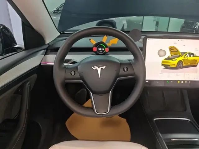 Tesla Model Y — Фото автомобиля 10