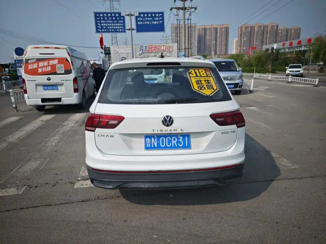 Volkswagen Tiguan L — Фото автомобиля 9