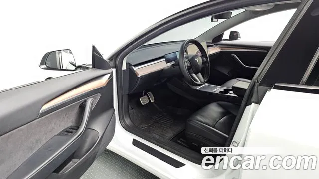 Tesla Model 3 — Фото автомобиля 19