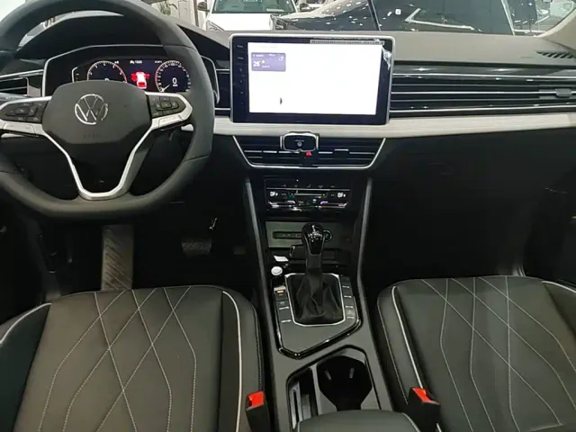 Volkswagen Tiguan L — Фото автомобиля 12