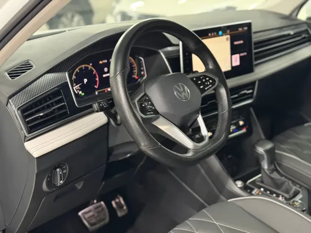Volkswagen Tiguan L — Фото автомобиля 5