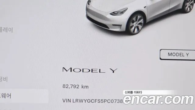 Tesla Model Y — Фото автомобиля 11