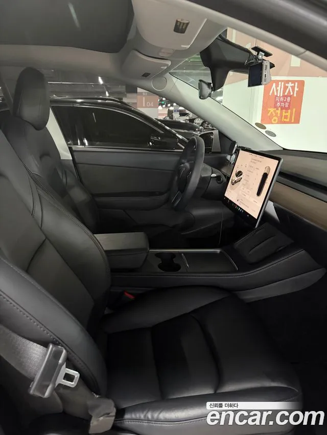 Tesla Model Y — Фото автомобиля 6