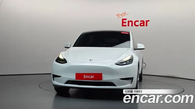 Tesla Model Y — Фото автомобиля 3